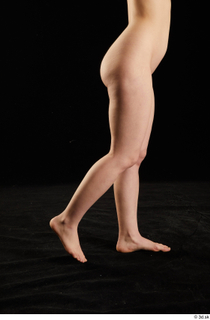 Elmira  1 calf flexing nude side view 0002.jpg